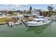 Waterfront home with private dock, boats, and canal access for boating and fishing at 301 Boca Ciega Dr, Madeira Beach, FL 33708