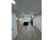 Well-lit kitchen with modern cabinets, sleek countertops, an island, and stainless-steel appliances at 3924 Orchard Hill Cir, Palm Harbor, FL 34684