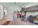 A spacious bedroom with a loft bed, colorful storage, and plenty of room for activities at 4010 Lithia Ridge Blvd, Valrico, FL 33596