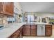 Spacious kitchen showcasing stone countertops, stainless steel appliances, and ample cabinet space at 4010 Lithia Ridge Blvd, Valrico, FL 33596