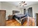 Spacious main bedroom with hardwood flooring and a sliding glass door at 4010 Lithia Ridge Blvd, Valrico, FL 33596