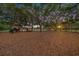 A view of the community playground featuring swings and play equipment for residents and their families to enjoy at 4010 Lithia Ridge Blvd, Valrico, FL 33596