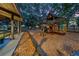 Community playground with modern play structures and a safe, wood chip-covered surface for children to enjoy at 4010 Lithia Ridge Blvd, Valrico, FL 33596