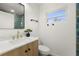 Bathroom featuring a marble countertop and a modern faucet at 429 88Th Ave, St Pete Beach, FL 33706
