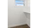 This closet offers a window and shelving for storage at 429 88Th Ave, St Pete Beach, FL 33706