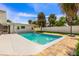 Backyard swimming pool with basketball hoop, brick patio, and privacy fence for outdoor fun and relaxation at 429 88Th Ave, St Pete Beach, FL 33706