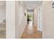 Inviting hallway with tile flooring leading to a bright, open living space at 456 Bahia Beach Blvd, Ruskin, FL 33570