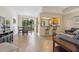 Inviting living space with dining area and kitchen view, filled with natural light and comfort at 456 Bahia Beach Blvd, Ruskin, FL 33570