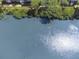 Aerial view of a tranquil waterway surrounded by lush greenery, showcasing natural beauty at 456 Bahia Beach Blvd, Ruskin, FL 33570