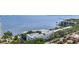 An aerial shot shows a condo with amazing waterfront views, lush trees, and a beautiful surrounding at 4950 Bayshore Blvd # 27, Tampa, FL 33611