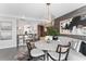 Stylish dining room featuring a round marble table, luxurious decor, and modern lighting at 4950 Bayshore Blvd # 27, Tampa, FL 33611