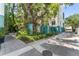 Exterior view showcases mature landscaping and architectural details of the building at 4950 Bayshore Blvd # 27, Tampa, FL 33611
