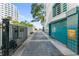 Exterior view of condo garages and gated access to the waterfront community at 4950 Bayshore Blvd # 27, Tampa, FL 33611