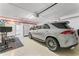 Spacious garage with epoxy floor and room for a car and exercise equipment at 4950 Bayshore Blvd # 27, Tampa, FL 33611