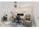 Comfortable home office with a neutral color palette, two monitors, and ample natural light at 4950 Bayshore Blvd # 27, Tampa, FL 33611
