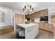Modern kitchen with a marble island, sleek appliances, and stylish wood cabinetry at 4950 Bayshore Blvd # 27, Tampa, FL 33611