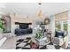 Elegant living room featuring modern lighting, stylish furniture, and chic decor at 4950 Bayshore Blvd # 27, Tampa, FL 33611