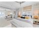 This spacious main bedroom boasts stylish decor and a large mirror reflecting stunning water views at 4950 Bayshore Blvd # 27, Tampa, FL 33611