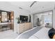 This is a spacious and luxurious main bedroom with water views, dressing area, and walk-in closet at 4950 Bayshore Blvd # 27, Tampa, FL 33611
