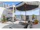 Charming rooftop deck with panoramic views, stylish decor, and cozy seating at 4950 Bayshore Blvd # 27, Tampa, FL 33611