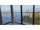Balcony view of the beautiful waterfront, palm trees, and city skyline at 500 N Osceola Ave # 808, Clearwater, FL 33755