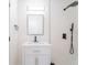 Modern bathroom with vanity, and a shower featuring sleek, modern hardware at 5290 101St Ave, Pinellas Park, FL 33782