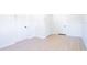 Bright bedroom with wood look floors, white walls and closet and doors at 5290 101St Ave, Pinellas Park, FL 33782