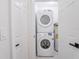 Stacked washer and dryer in dedicated laundry area with a water heater at 5290 101St Ave, Pinellas Park, FL 33782