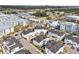 Panoramic aerial shot of townhomes near a roundabout, displaying a well-planned community and convenient street parking at 5351 Bridge St # 15, Tampa, FL 33611