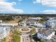 Stunning aerial view of a community showcasing lush landscaping, pedestrian areas, and vibrant commercial spaces at 5351 Bridge St # 15, Tampa, FL 33611