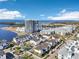 Aerial view of the community by the bay with a high rise in the distance on a clear day at 5351 Bridge St # 15, Tampa, FL 33611