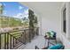 Serene balcony offering picturesque views and a cozy seating arrangement at 5351 Bridge St # 15, Tampa, FL 33611