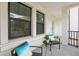 Charming balcony with comfortable seating, enhancing the outdoor living experience at 5351 Bridge St # 15, Tampa, FL 33611