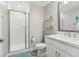 Bright bathroom with a white vanity, shower, and modern fixtures at 5351 Bridge St # 15, Tampa, FL 33611