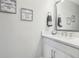 Bathroom featuring a white vanity with modern fixtures and neutral decor at 5351 Bridge St # 15, Tampa, FL 33611