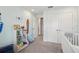 Bright Bedroom with white furniture and blue accents at 5351 Bridge St # 15, Tampa, FL 33611