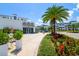 Attractive commercial building with outdoor seating, lush landscaping, and pedestrian-friendly access at 5351 Bridge St # 15, Tampa, FL 33611