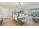 Dining area with stylish chairs, elegant lighting, and open layout providing a welcoming space at 5351 Bridge St # 15, Tampa, FL 33611