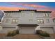 Charming townhome featuring three garage doors and inviting curb appeal at 5351 Bridge St # 15, Tampa, FL 33611