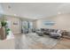 Cozy living room with large window, comfortable seating, and neutral decor creating a relaxing atmosphere at 5351 Bridge St # 15, Tampa, FL 33611
