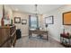 Well-lit office with a unique desk, shelving, and decor at 5351 Bridge St # 15, Tampa, FL 33611