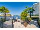 Scenic outdoor patio with comfortable seating, perfect for enjoying waterfront views and outdoor relaxation at 5351 Bridge St # 15, Tampa, FL 33611