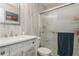 Updated bathroom featuring modern fixtures, vanity with stylish finishes, and a glass-enclosed shower at 5638 13Th N Ave, St Petersburg, FL 33710