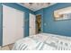 Cozy bedroom with a closet, calming paint color, and comfortable bed at 5638 13Th N Ave, St Petersburg, FL 33710