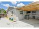 Exterior of house with covered patio and a small landscaped area in the backyard, great for outdoor entertaining and relaxing at 5638 13Th N Ave, St Petersburg, FL 33710