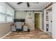 Bright office space features a modern desk, a sliding barn door, and lots of natural light at 5638 13Th N Ave, St Petersburg, FL 33710
