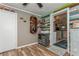 Bright office space showcases a custom wine rack, decor, custom floors, and access to the kitchen at 5638 13Th N Ave, St Petersburg, FL 33710