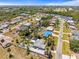Waterfront community featuring charming homes, canals, and lush landscaping in a tranquil coastal setting at 595 Denburn Ct, Englewood, FL 34223