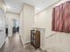 Hallway with wood floors has easy access to other areas of the home at 602 Cabernet Way, Oldsmar, FL 34677