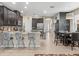 Open concept Kitchen with granite countertops, stainless appliances, and views to the living space at 602 Cabernet Way, Oldsmar, FL 34677
